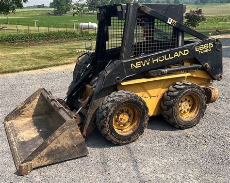 new holland 665 skid steer hydraulic cylinder rebuild|new holland lx565 specifications.